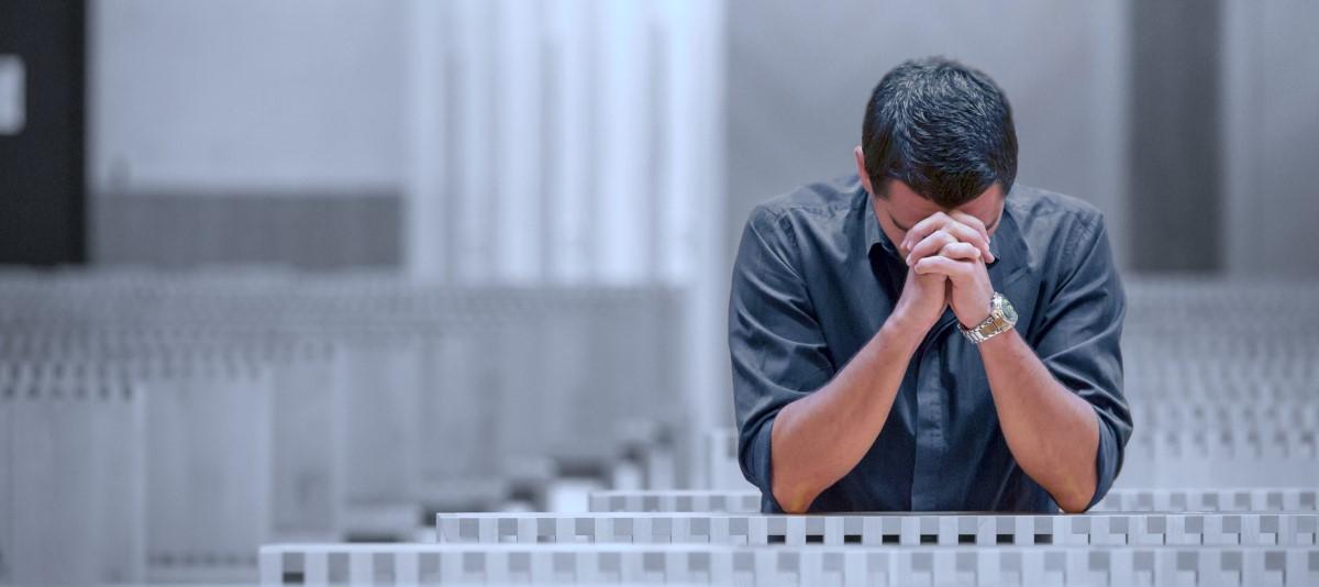 Misunderstood man praying