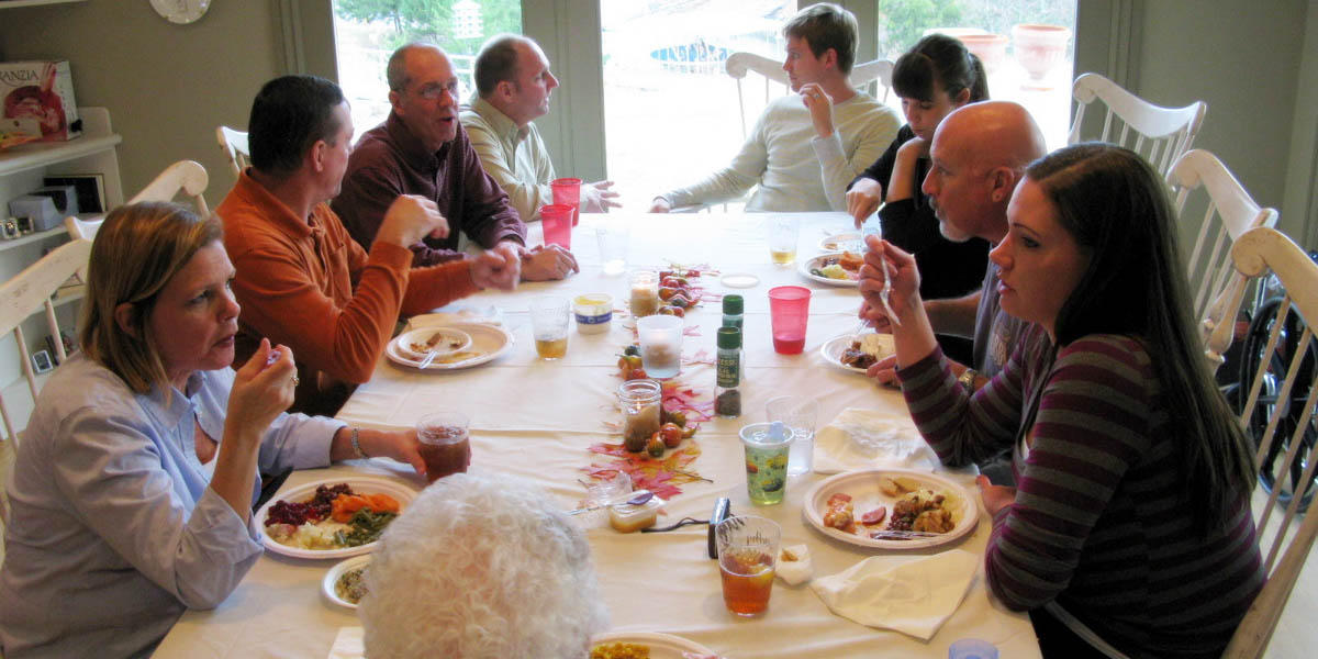 FAMILY AROUND TABLE