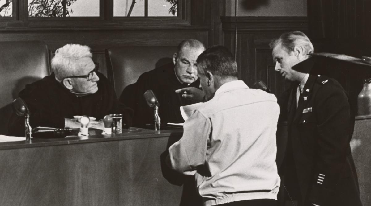 Spencer Tracy and Richard Widmark with director Stanley Kramer on the set of "Judgment at Nuremberg," 1961