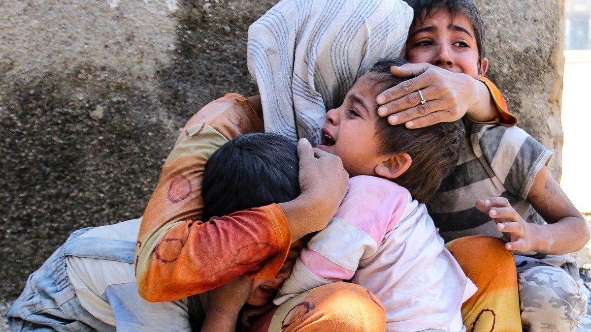 web-aleppo-mother-children-000_nic6327056-zein-al-rifai-afp