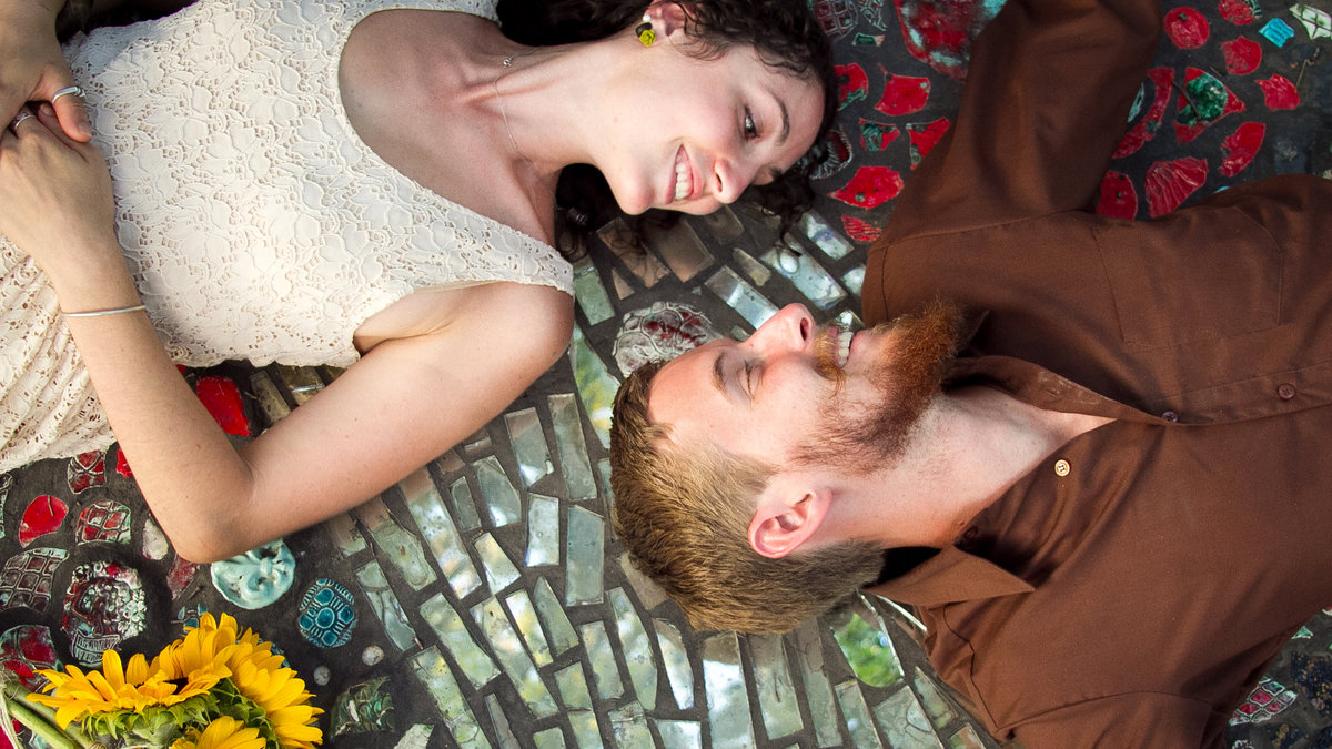 web-enagement-couple-flowers-laying-down-shelley-n-cc