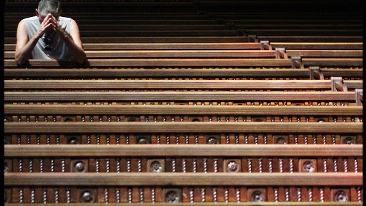 WEB-Man-Praying-Pews-Charles-Clegg-CC.