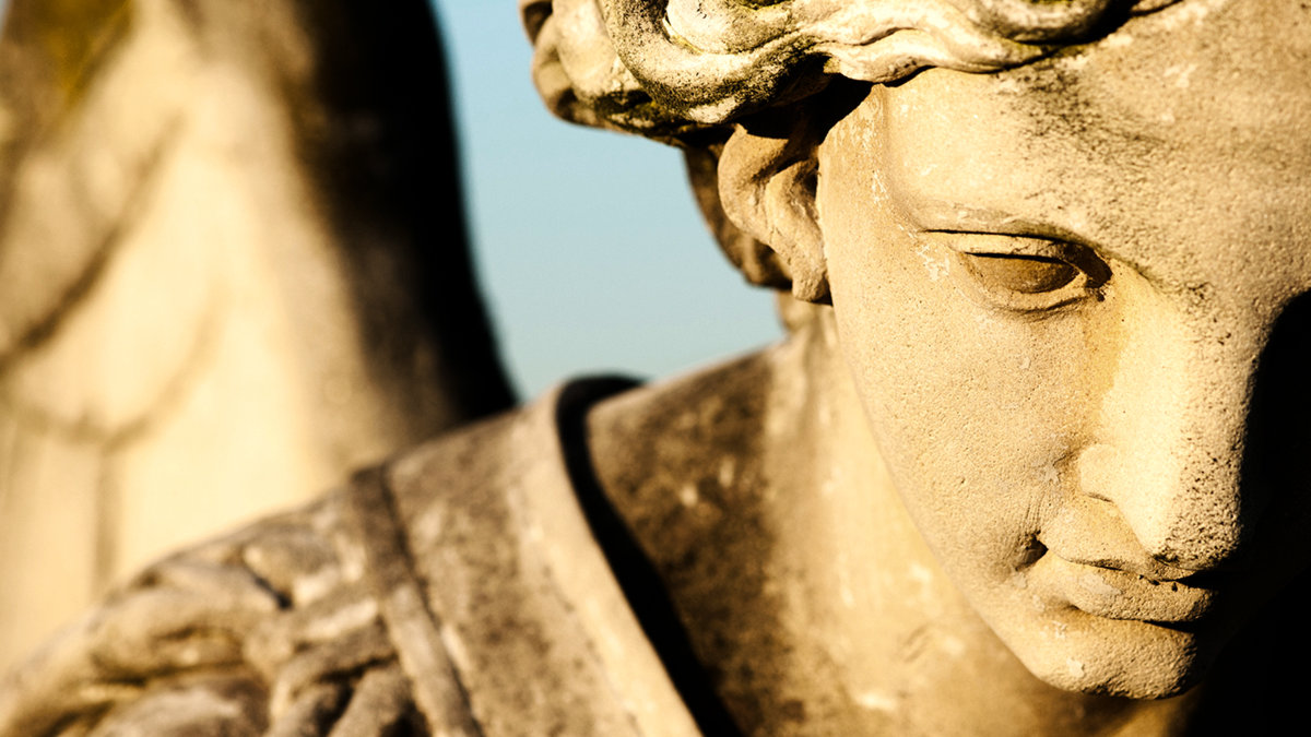 web-guardian-angel-statue-eye-close-up-umb-o-shutterstock_91984811