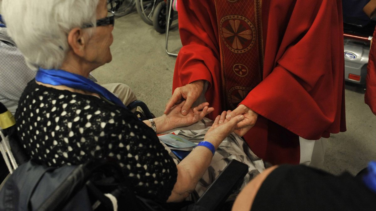 web-hands-sacrement-of-sicks-bishop-p-razzociric