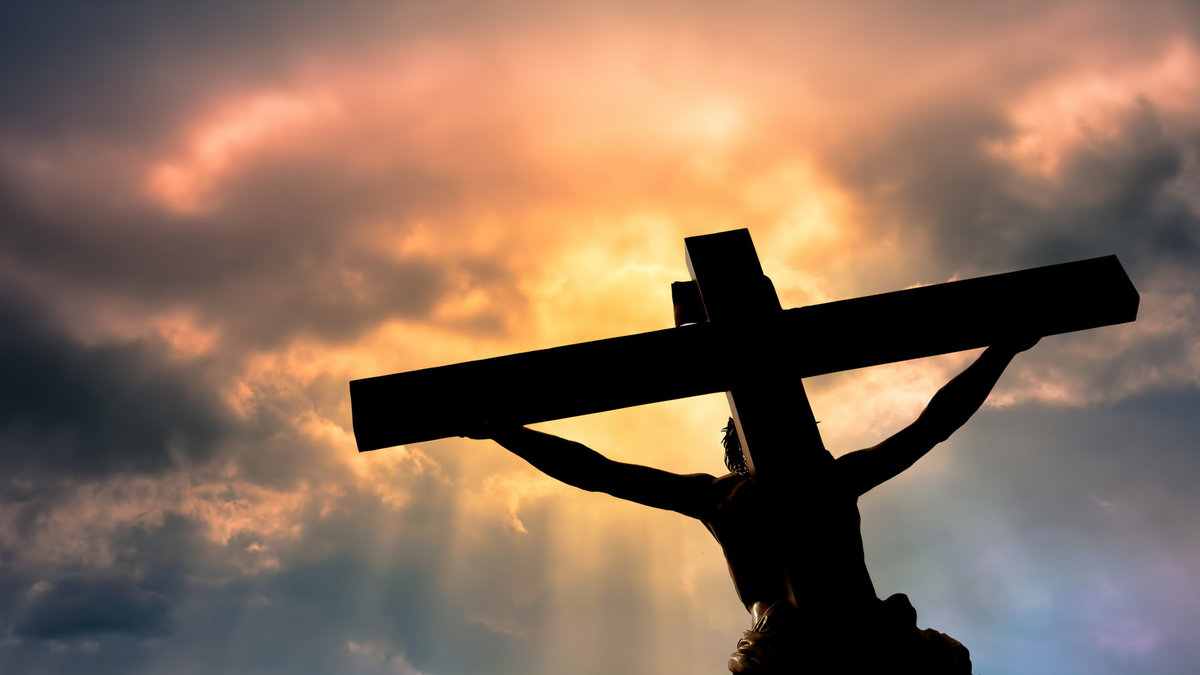 Jesus Christ Son of God over dramatic sky background religion and spirituality concept