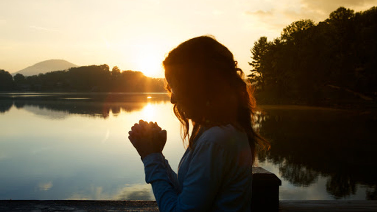 Woman In Prayer