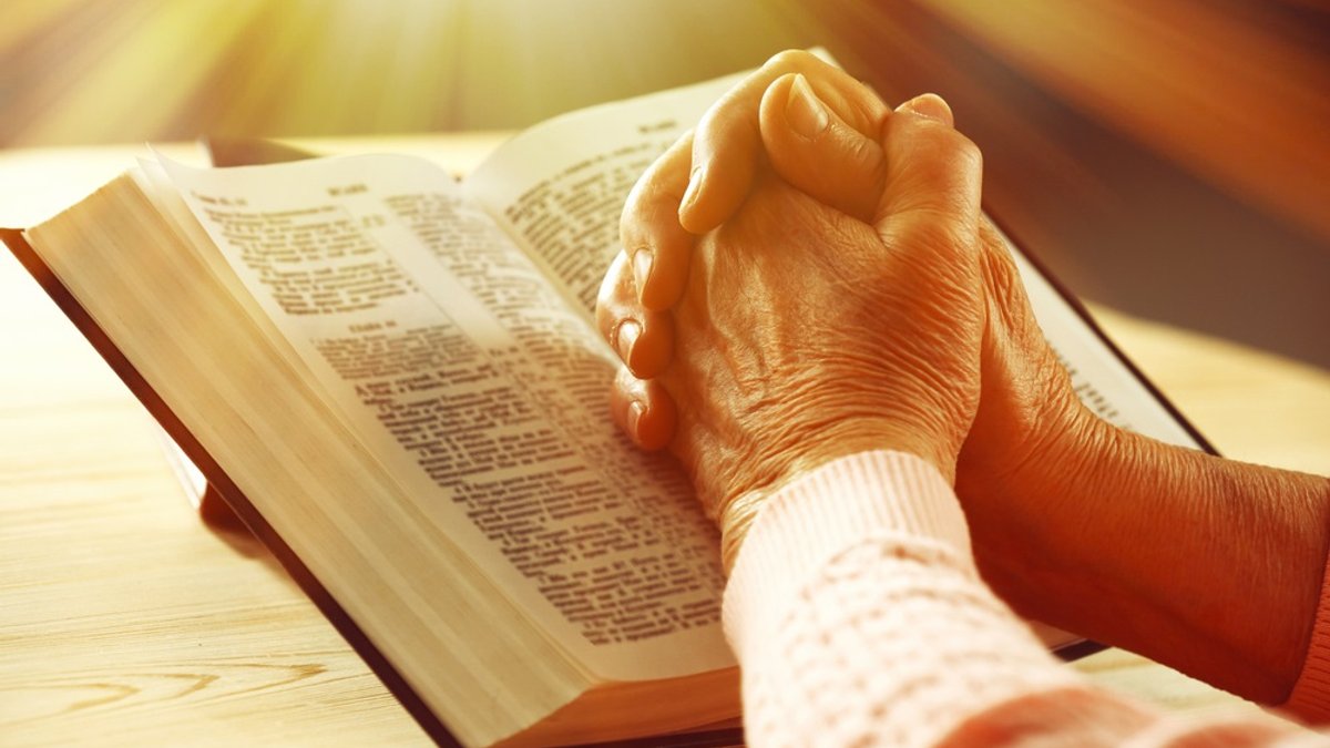 web-praying-hands-bible-saints-africastudio-shutterstock_244107115