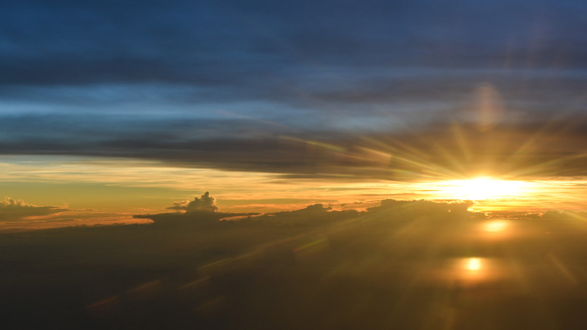 web-sun-sky-clouds-flight-via-sarmiento-cc