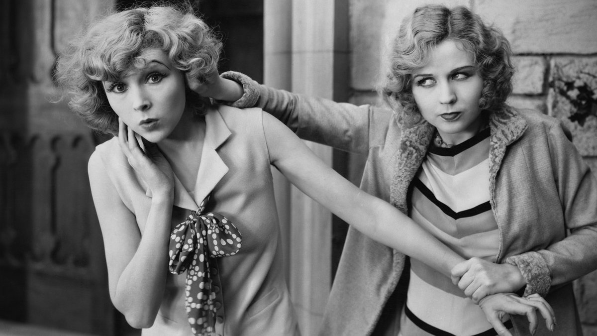 WEB-WOMEN-MONOCHROME-RETRO-FIGHTING-Everett-Collection-Shutterstock_93651373