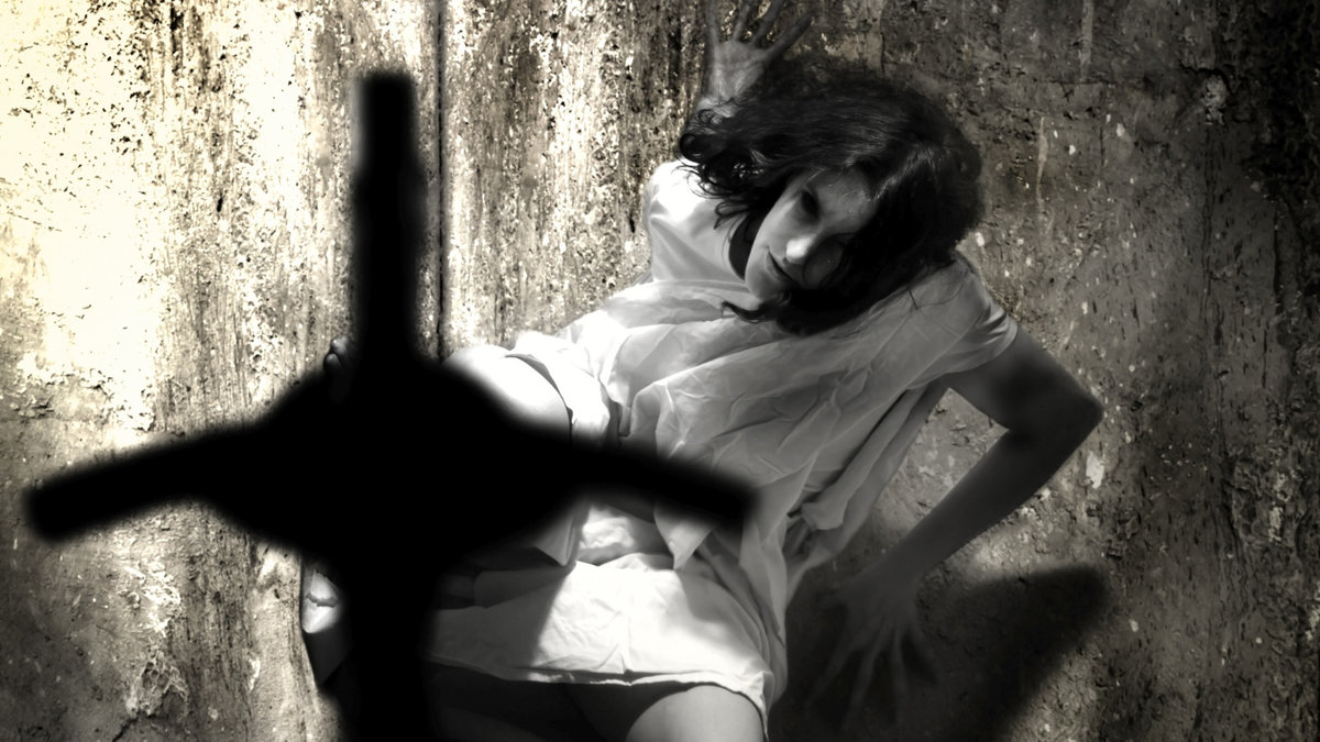 Exorcism and woman possessed by devil grunge unique concept