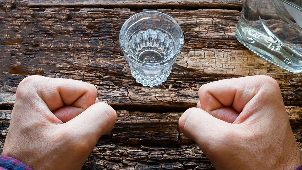 web3-man-hands-alcohol-vodka-itakdalee-shutterstock.jpg