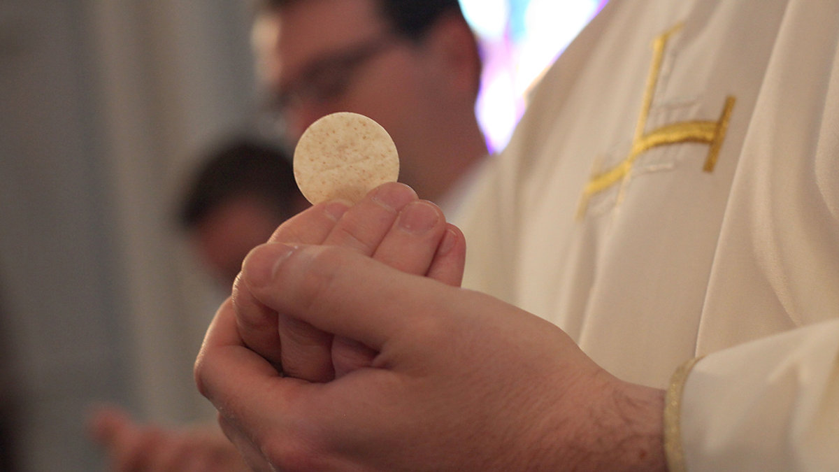 PRIEST'S HANDS,EUCHARIST