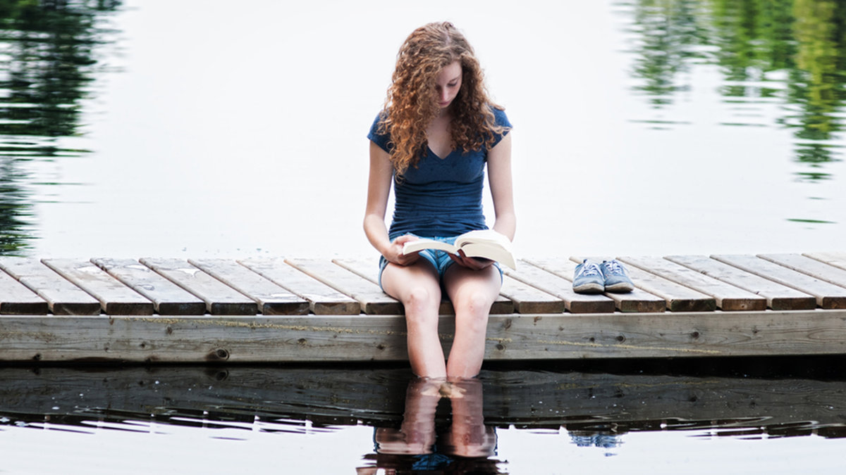 shutterstock_294633350-teen-book-summer-e1668784537840.jpg