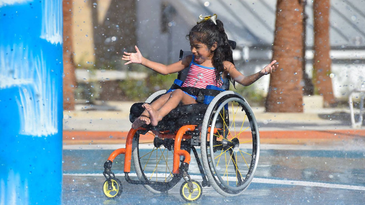 WEB3 LITTLE GIRL WHEELCHAIR WATERPARK MORGAN INSPIRATION ISLAND DISABILITIES Morgan’s Wonderland Facebook