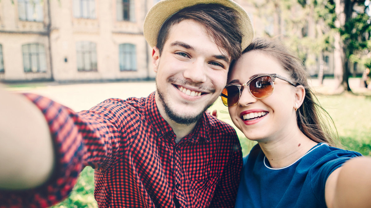 WEB3 MAN WOMAN COUPLE MARRIED YOUNG TRAVEL SELFIE Shutterstock