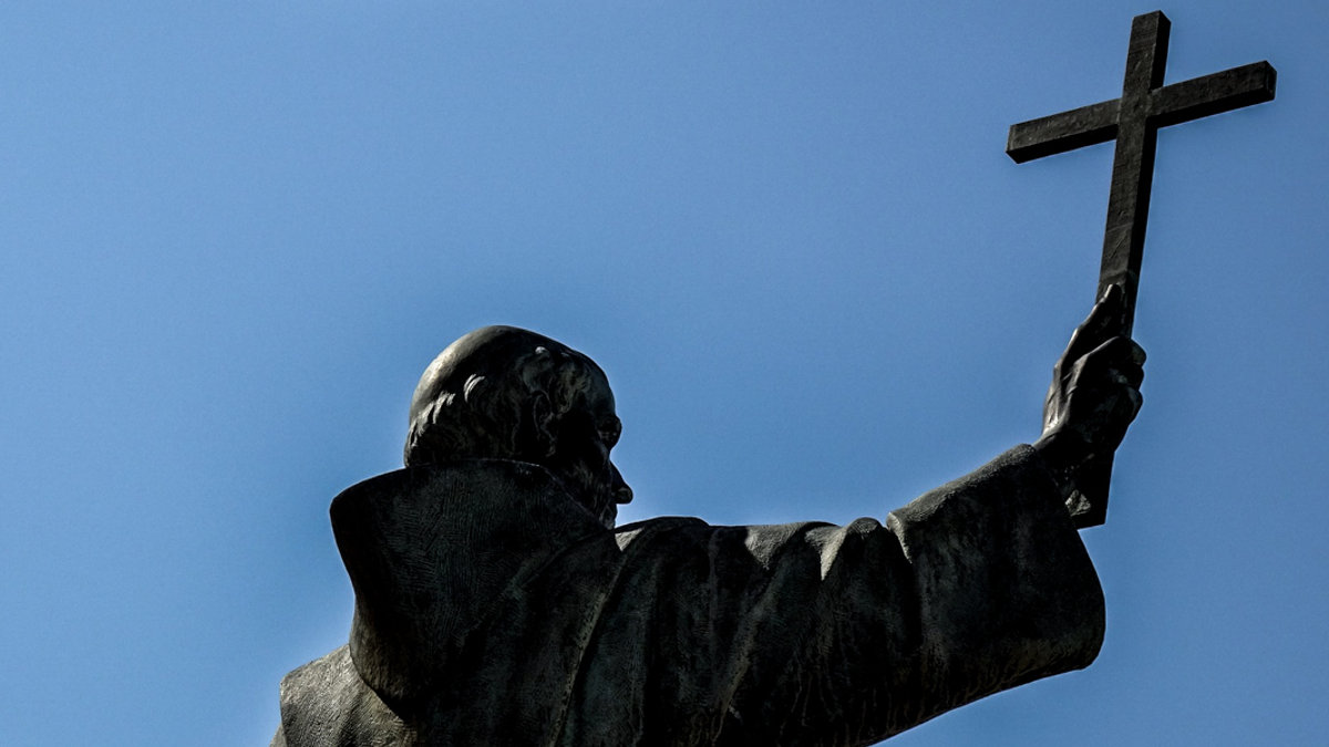MONK STATUE, CROSS