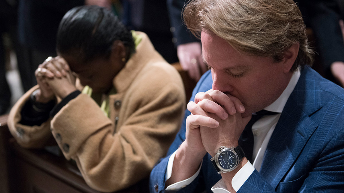 MAN PRAYING