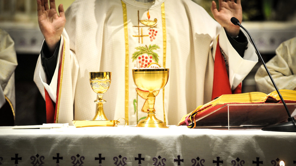 PRIEST WITH ALTER