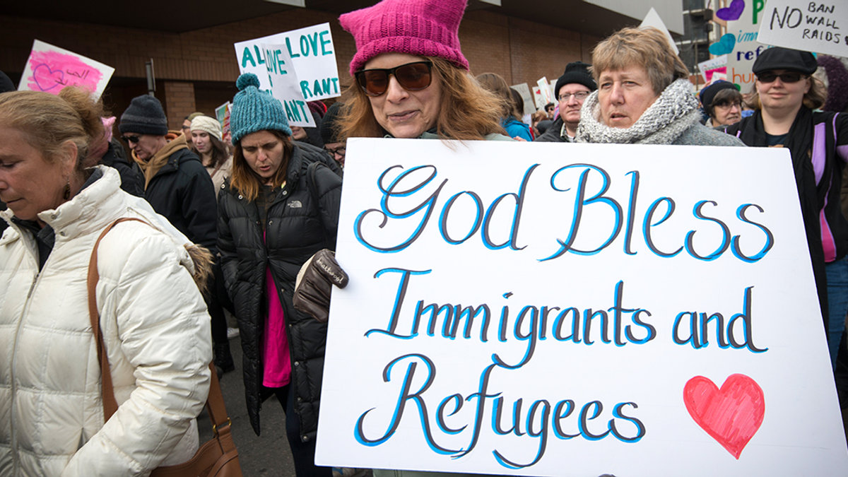 GOD BLESS IMMIGRANTS REFUGEES