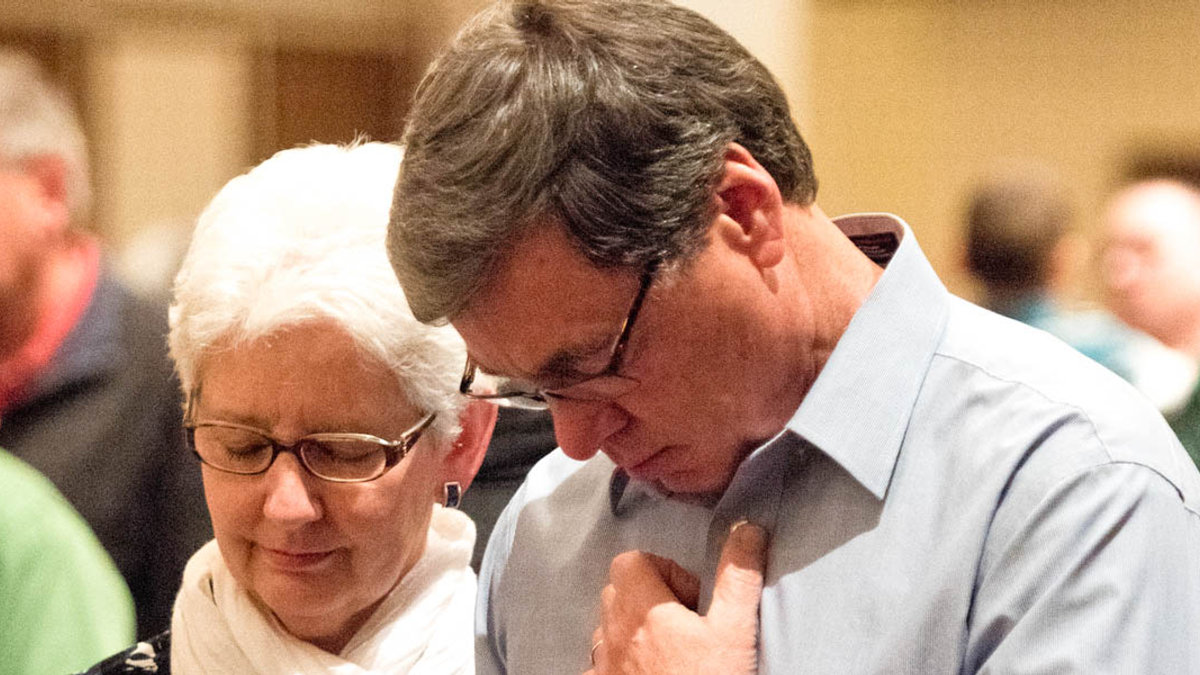 MAN AND WOMAN,PRAYING