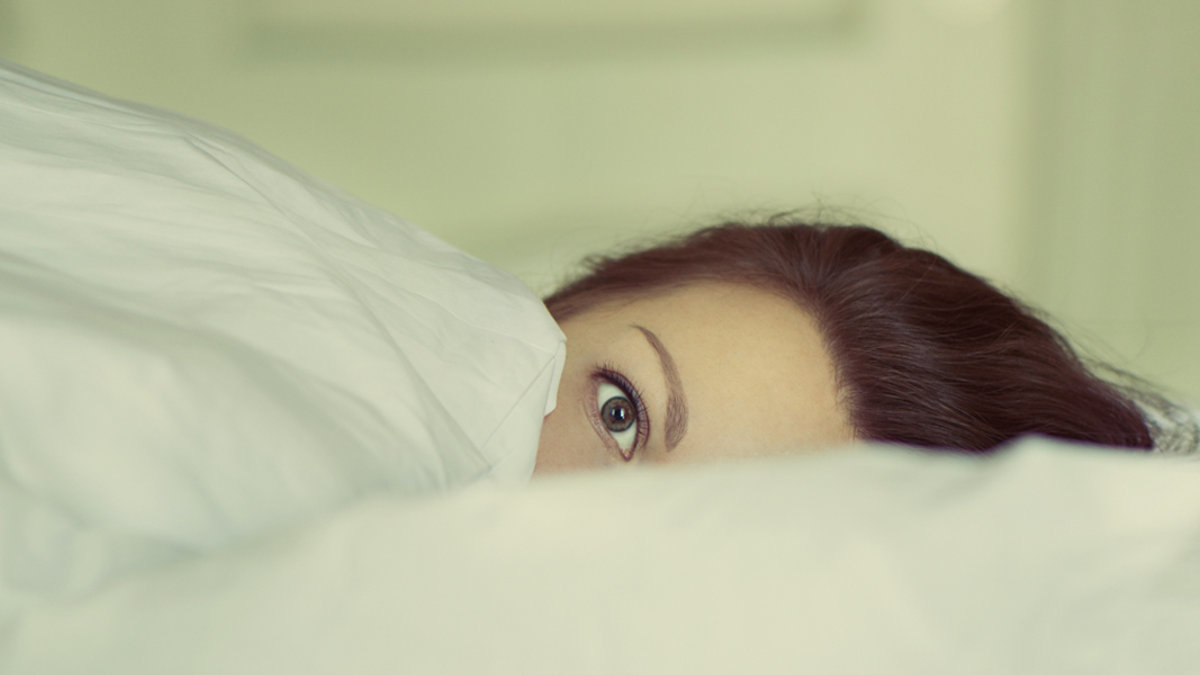 WOMAN,BED,AWAKE