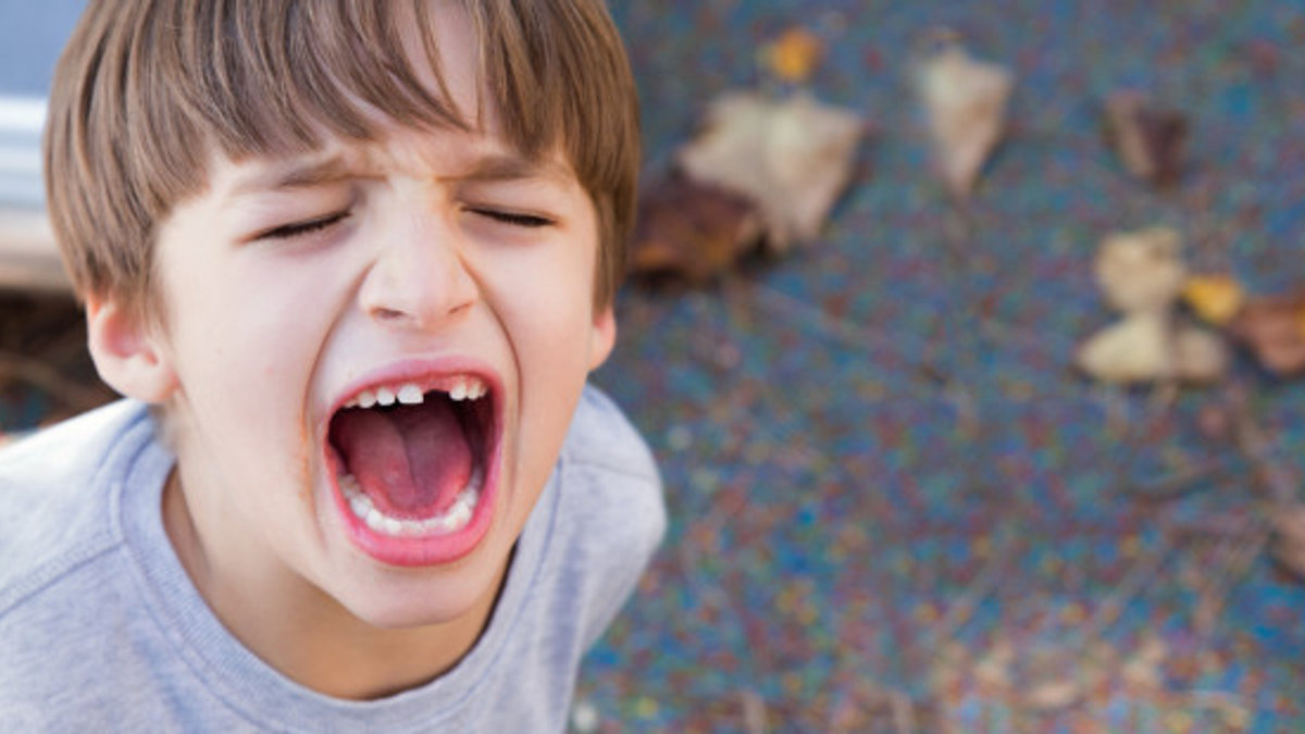 web3-little-boy-angry-yelling-crying-outside-missing-teeth-tantrum-shutterstock