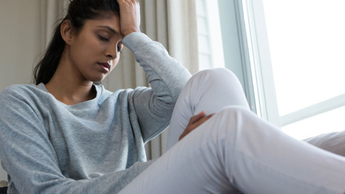 web3-woman-tired-sofa-closed-eyes-shutterstock_697785295-wavebreakmedia-ai