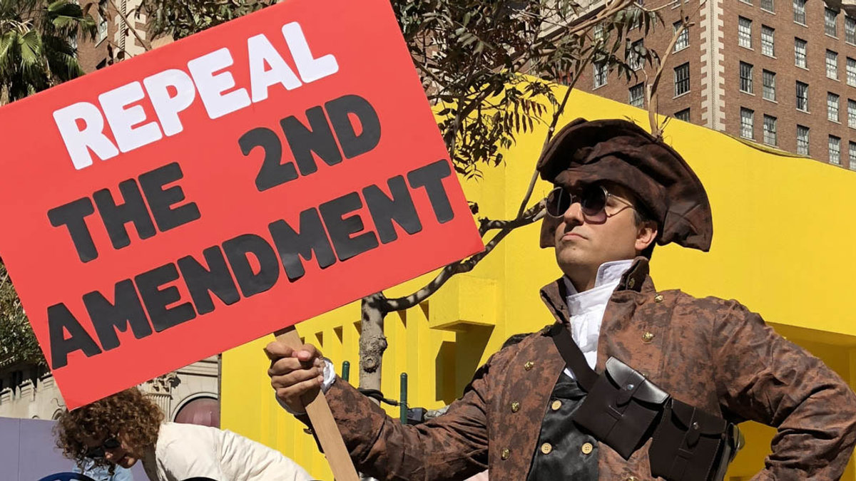 PROTESTOR WITH SIGN