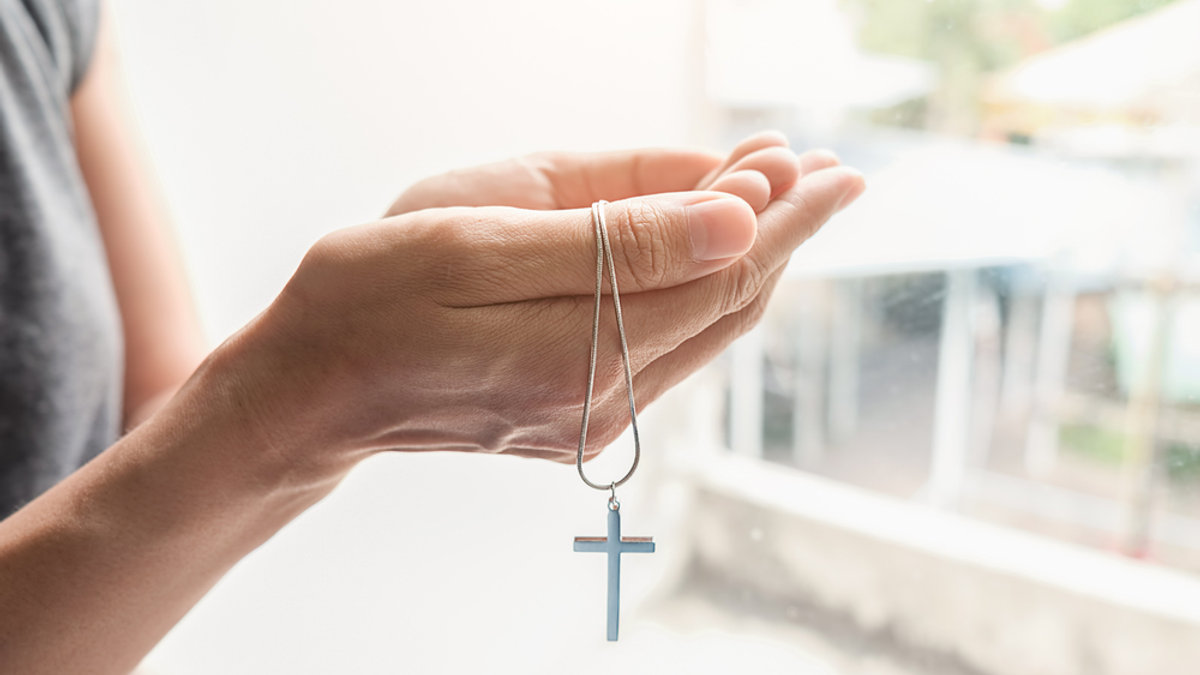 CROSS, HANDS, OPEN