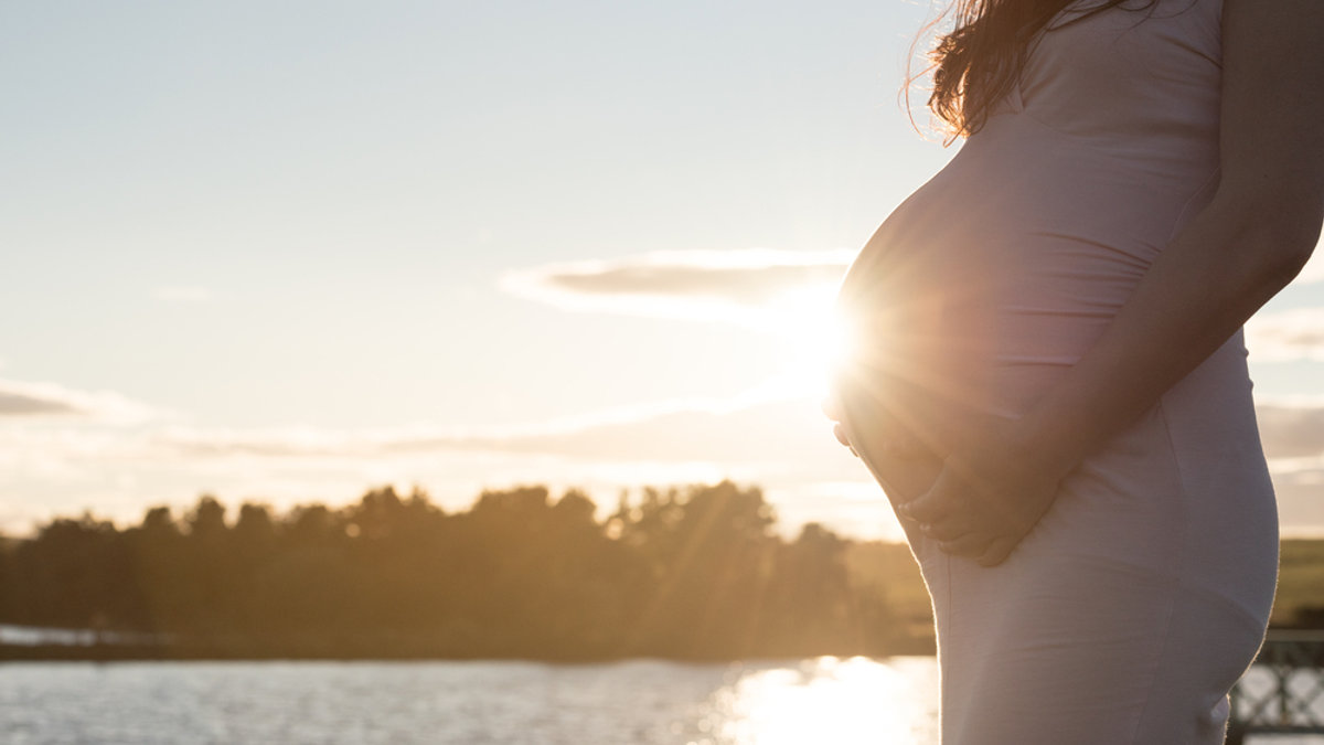 WOMB, PREGNANT, SUNSET