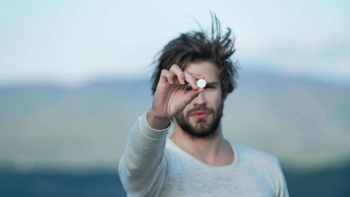 MAN WITH PILL