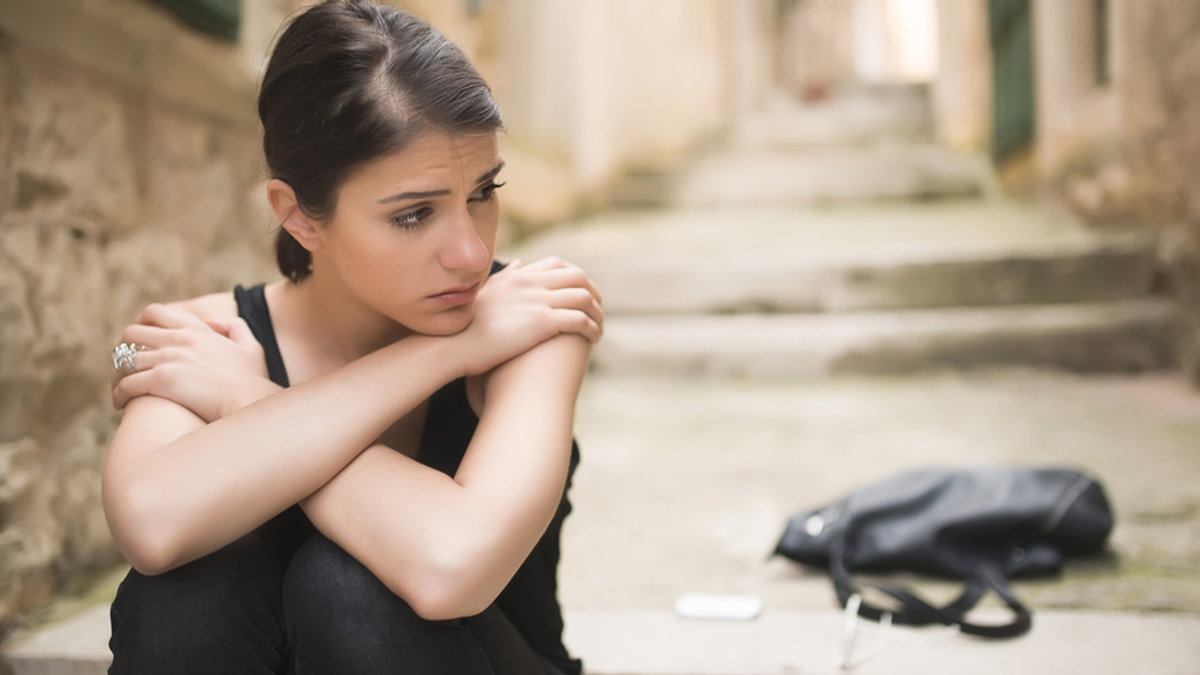 SAD; WOMAN