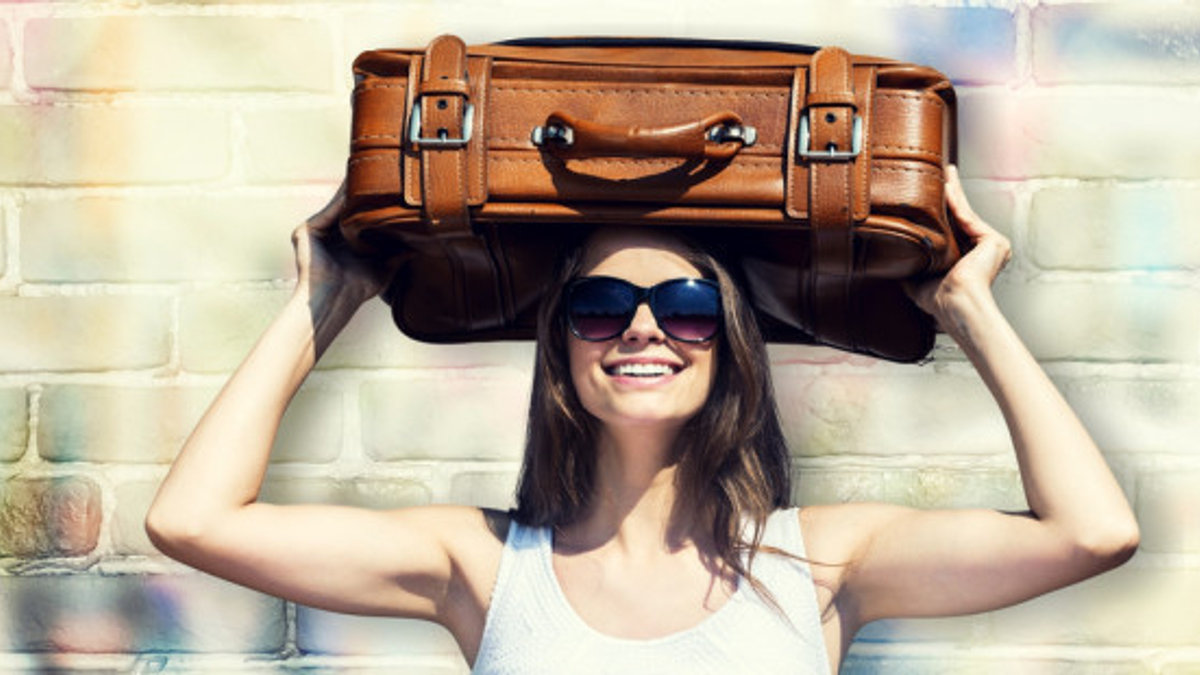 WOMAN WITH SUITCASE