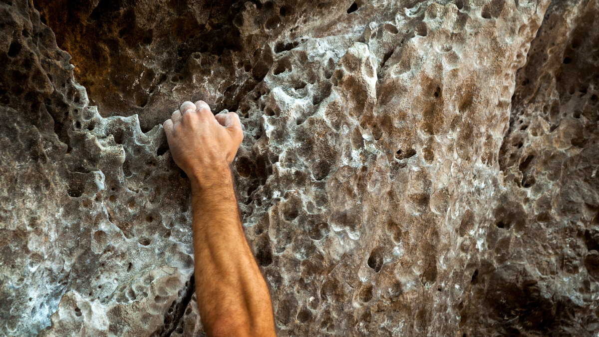 MALE HAND CLIMBING