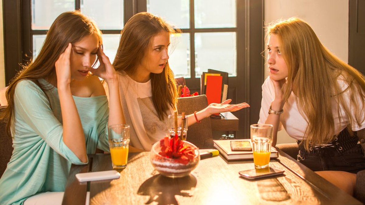 web-women-rumor-talk-headache-stress-shutterstock_721035337-by-bojan-milinkov.jpg