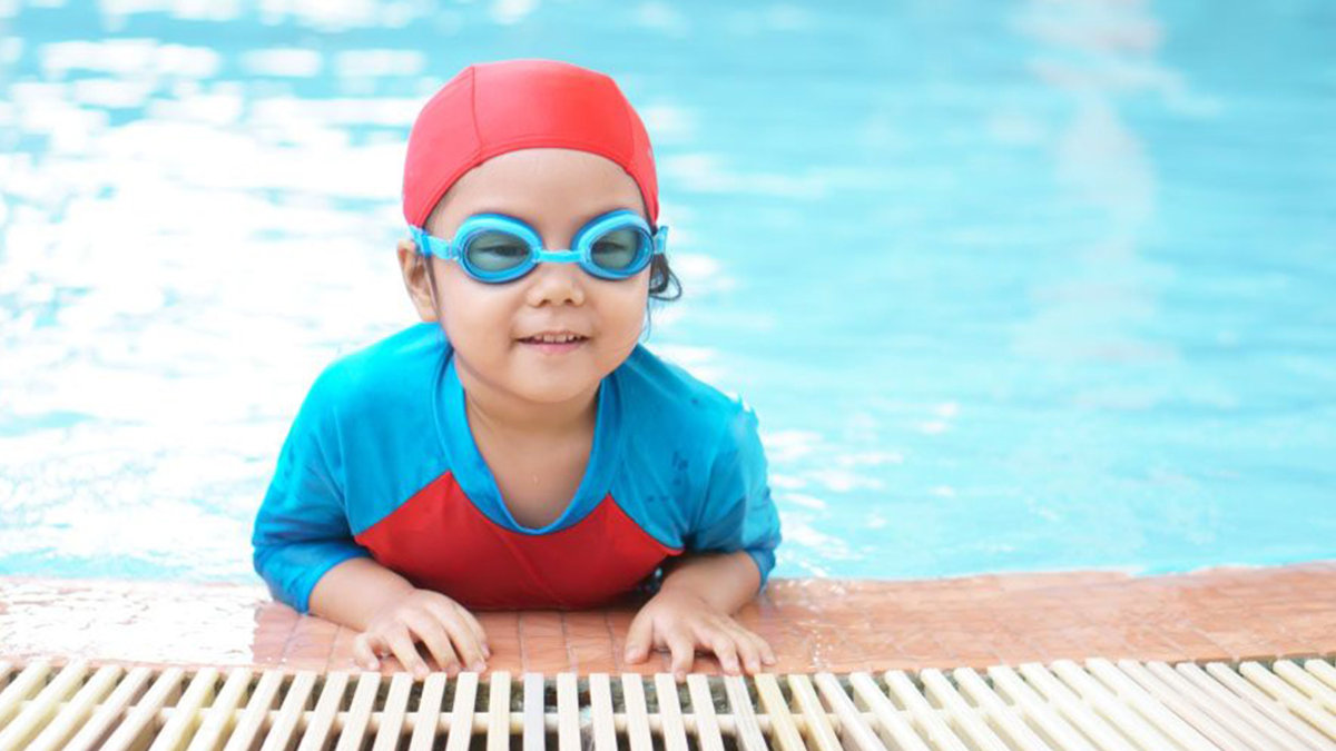 web3-sport-child-girl-swim-shutterstock_1361544374-by-kornnphoto.jpg