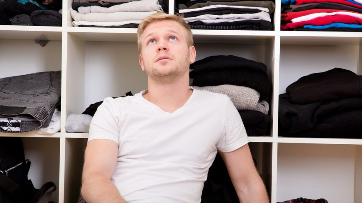 MAN AT THE CLOSET