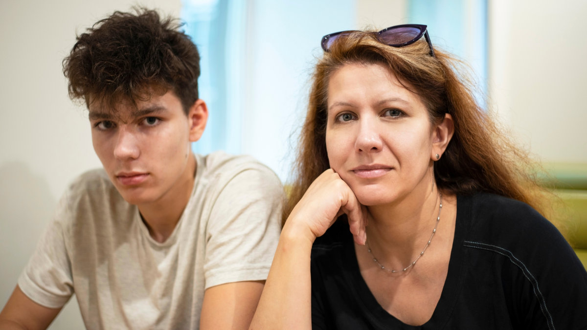 web2-a-middle-aged-woman-with-his-teenage-son-resting-at-the-cafe-and-talking-about-teenage-problems.-mom-has-fun-but-the-son-is-very-serious-shutterstock_1441155383.png
