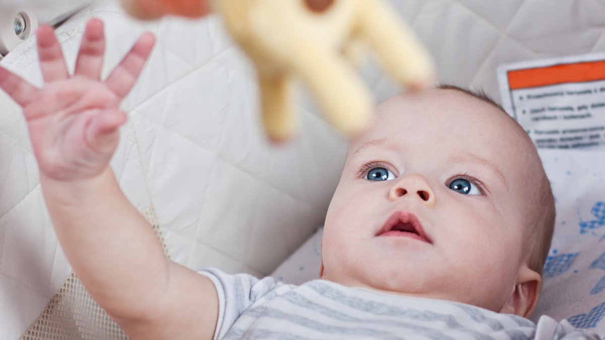 baby boy in a cradle