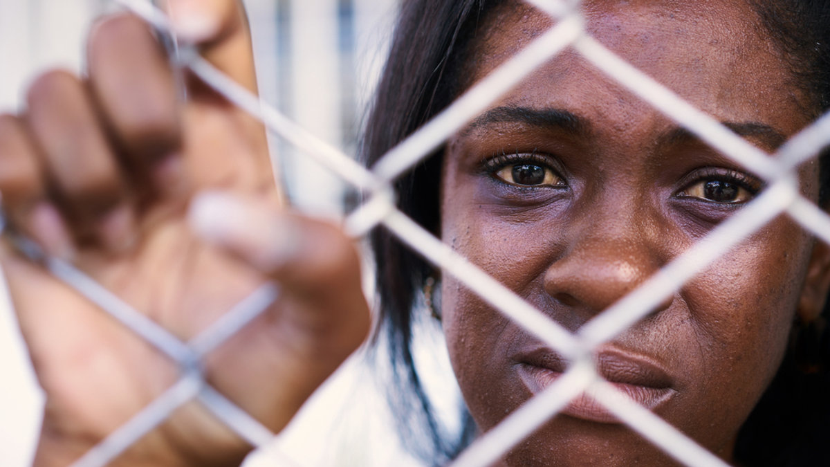 African woman crying