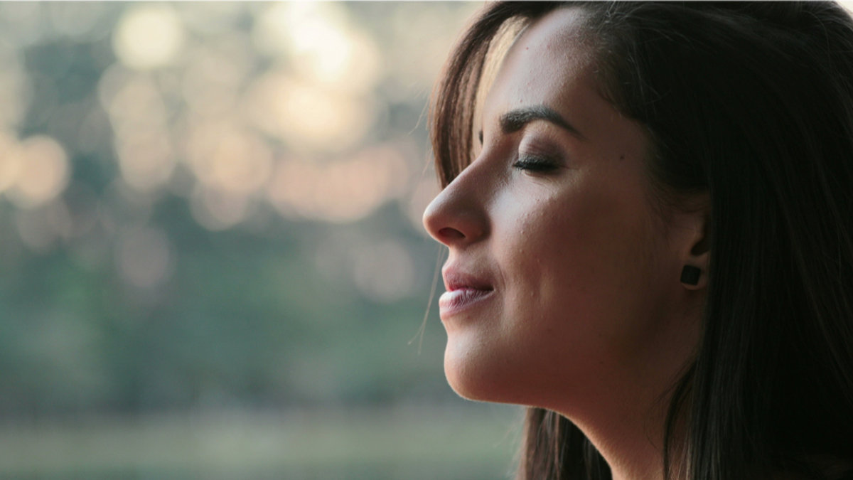 WOMAN, EYES CLOSED,