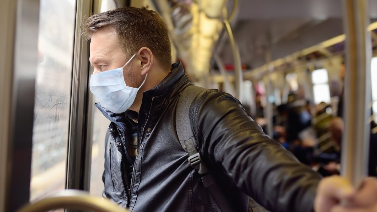 MASK-MAN-TRANSPORTS-WEARINESS-shutterstock_1693682953.jpg