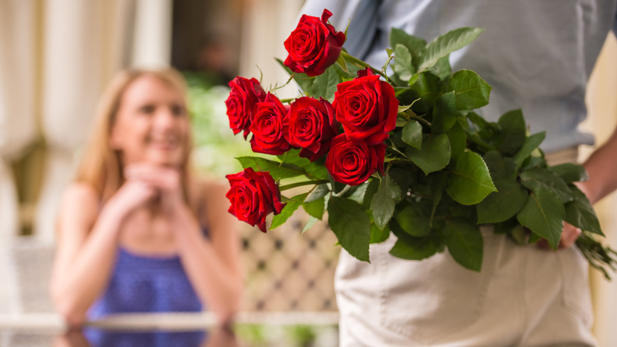 WOMAN RECEIVING ROSES