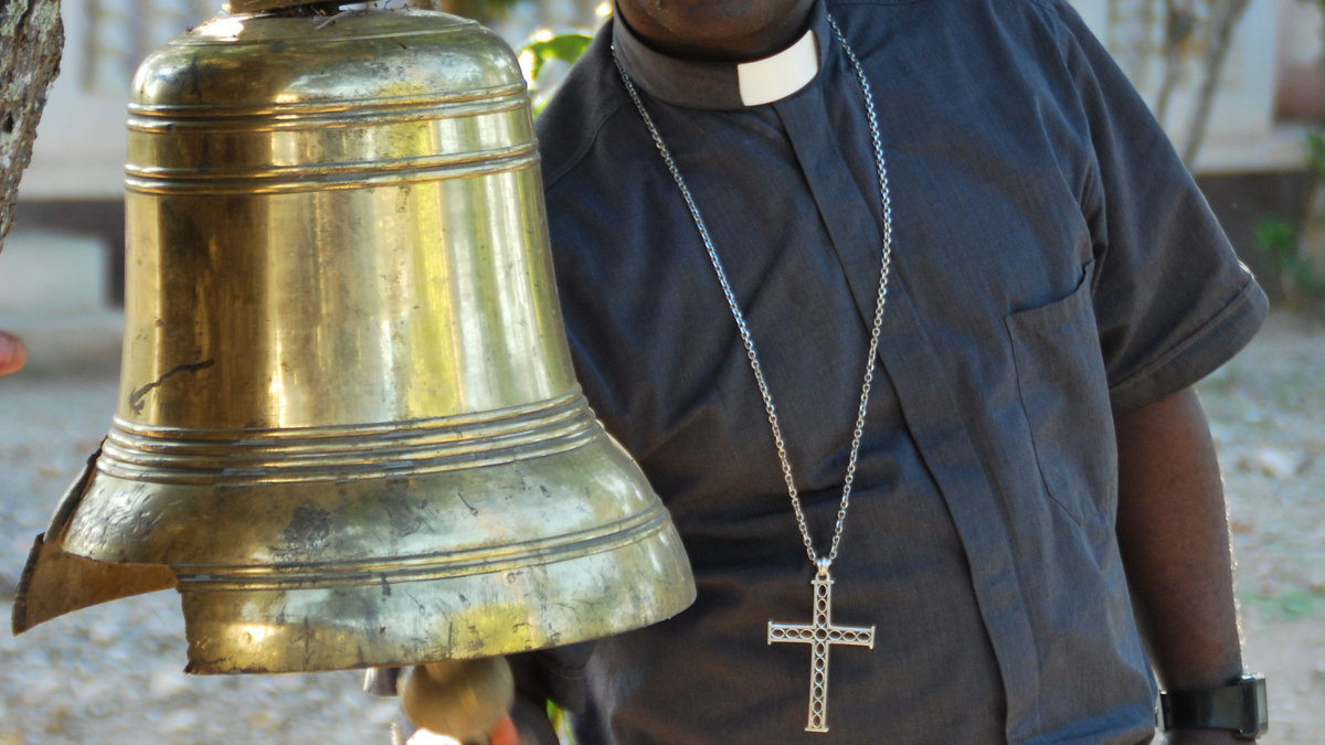 HAITIAN PRIEST