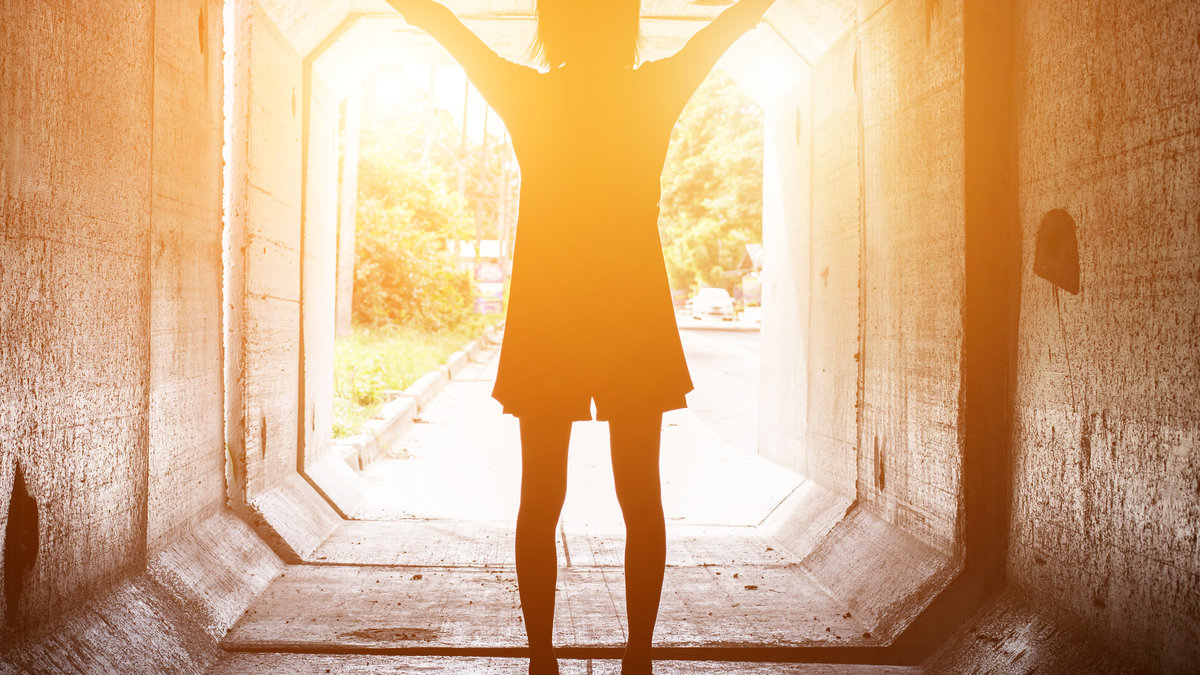 WOMAN, TUNNEL, LIGHT