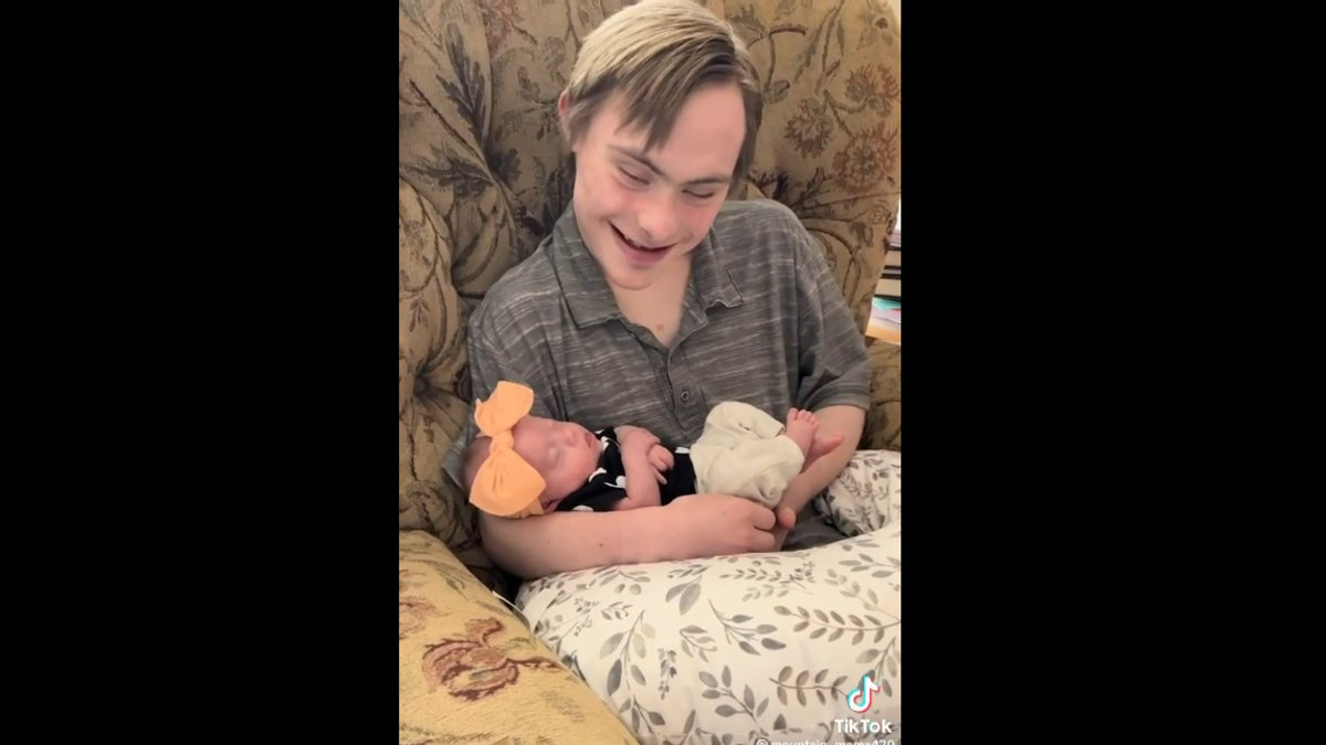 Man Down Syndrome Baby