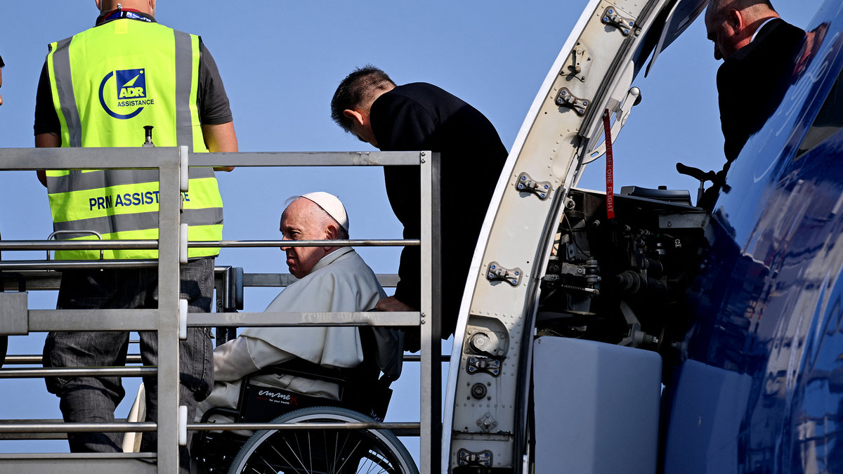 Pope-Francis-boards-his-plane-at-Romes-Fiumicino-airport-as-he-departs-for-a-trip-to-Canada-AFP-