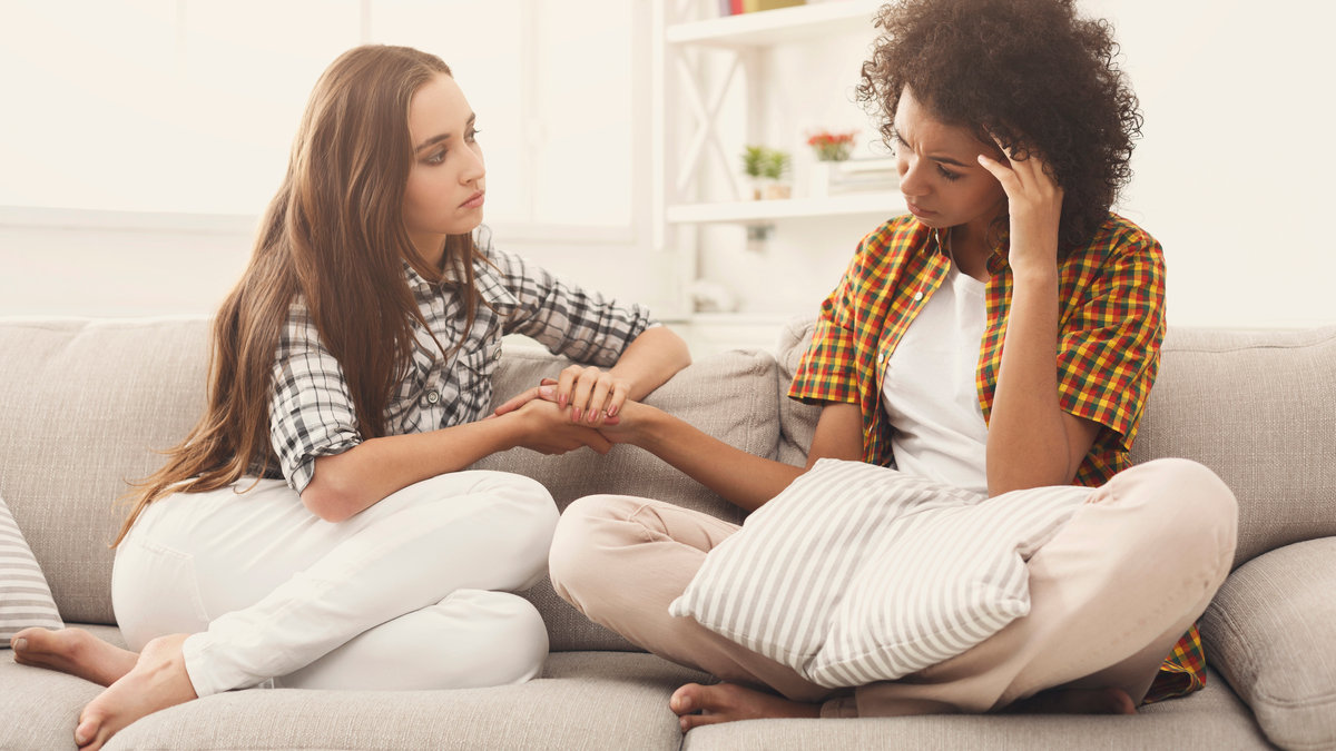 TALK-FRIENDS-CONSOLATION-SAD-shutterstock_1059280925.jpg