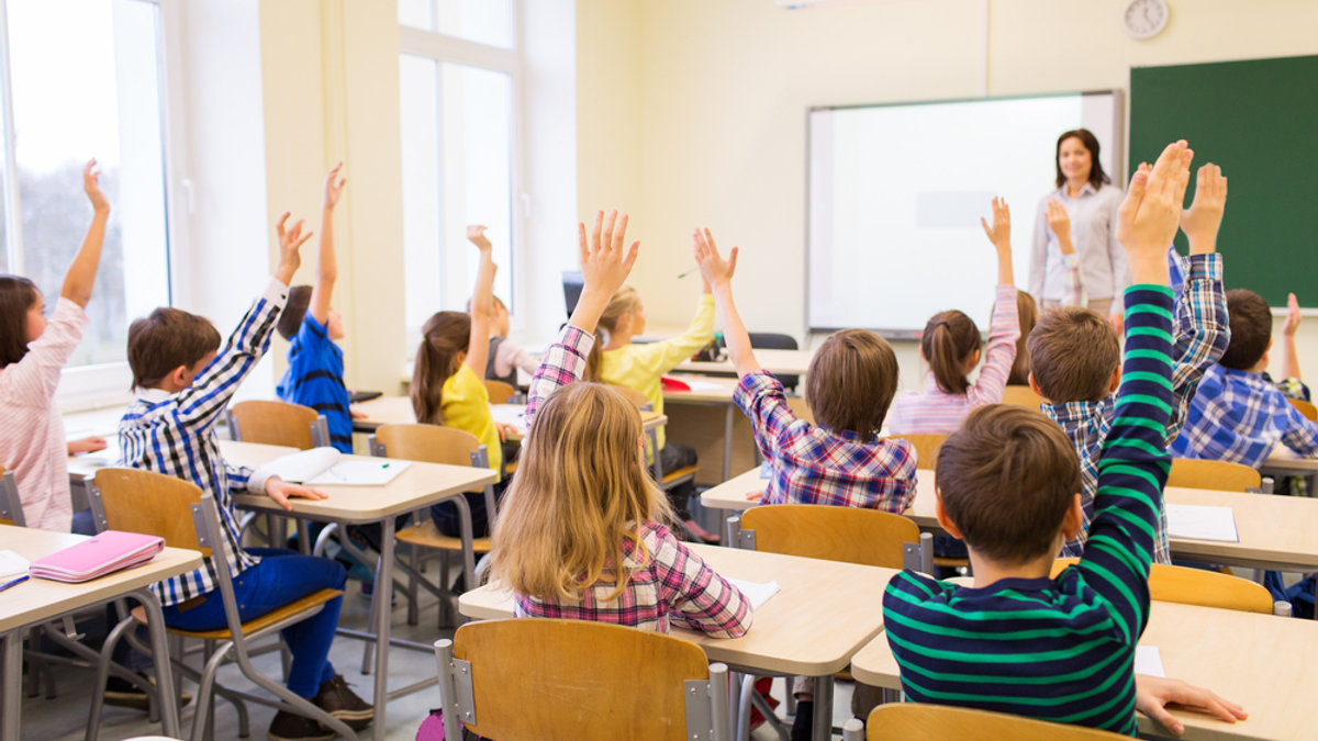 elementry students learning in classroom