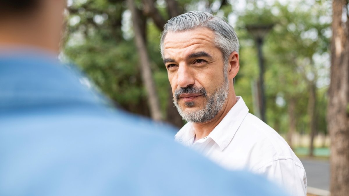 man talking with friend